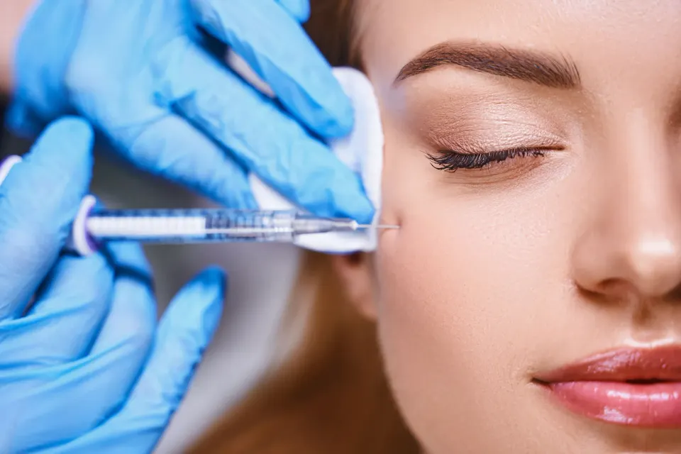 Provider preparing Botox injection for a patient at Florida Keys Primary Care & Wellness in Big Pine Key, FL