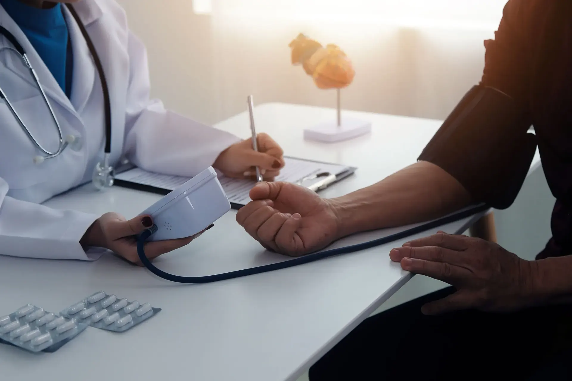 Provider checking a patient's blood pressure at Florida Keys Primary Care in Big Pine Key, FL