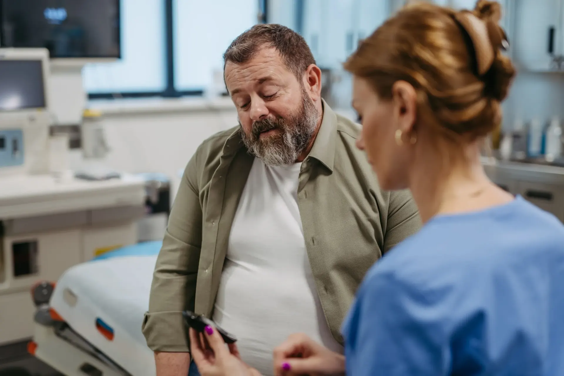 Provider reviewing a lipid panel with a patient at Florida Keys Primary Care in Big Pine Key, FL