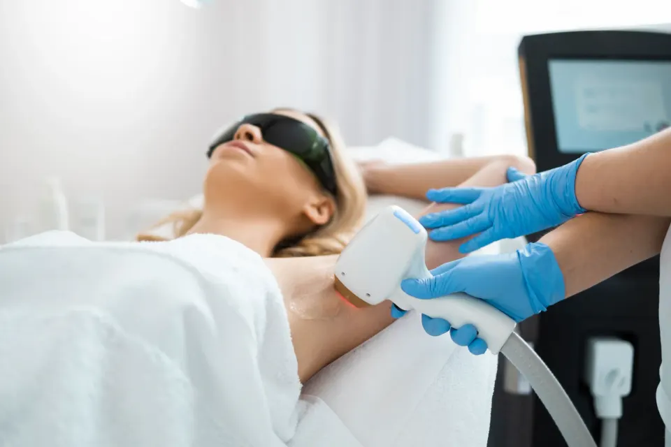 Patient receiving laser hair removal treatment with Nirvana technology at Florida Keys Primary Care & Wellness in Big Pine Key, FL